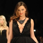  Miranda Kerr Distracts from $3 Million Necklace Revealing Gowns Plunge  During a Catwalk Show