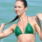  Oscar when you have THIS body? Candice Swanepoel Shows off Famous Curves in Green bikini