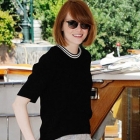 Emma Stone in black blouse