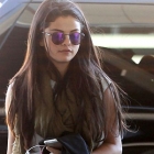  Selena Gomez Makeup-free looks downcast leaving Toronto