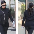 Kim Kardashian in black jacket and leggings