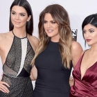  Kendall and Kylie Jenner show some Leg on the AMA Red Carpet