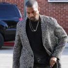  Kanye West Sports a Glum look Heading into the Studio