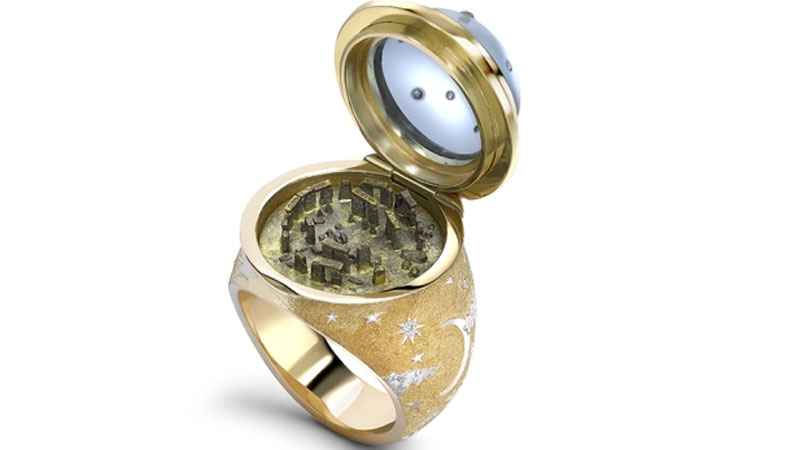  This Diamond-Encrusted Gold Ring Has a Miniature Stonehenge in It