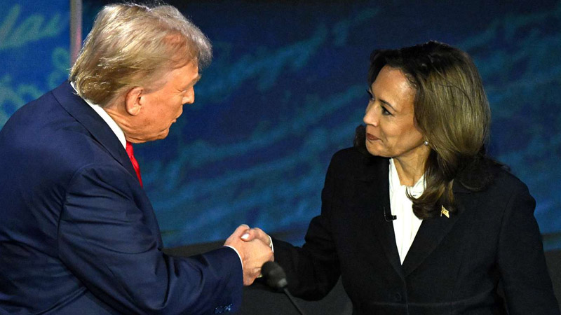  Donald Trump’s Surprising Two-Word Reaction to Kamala Harris’ Bold Handshake Move!